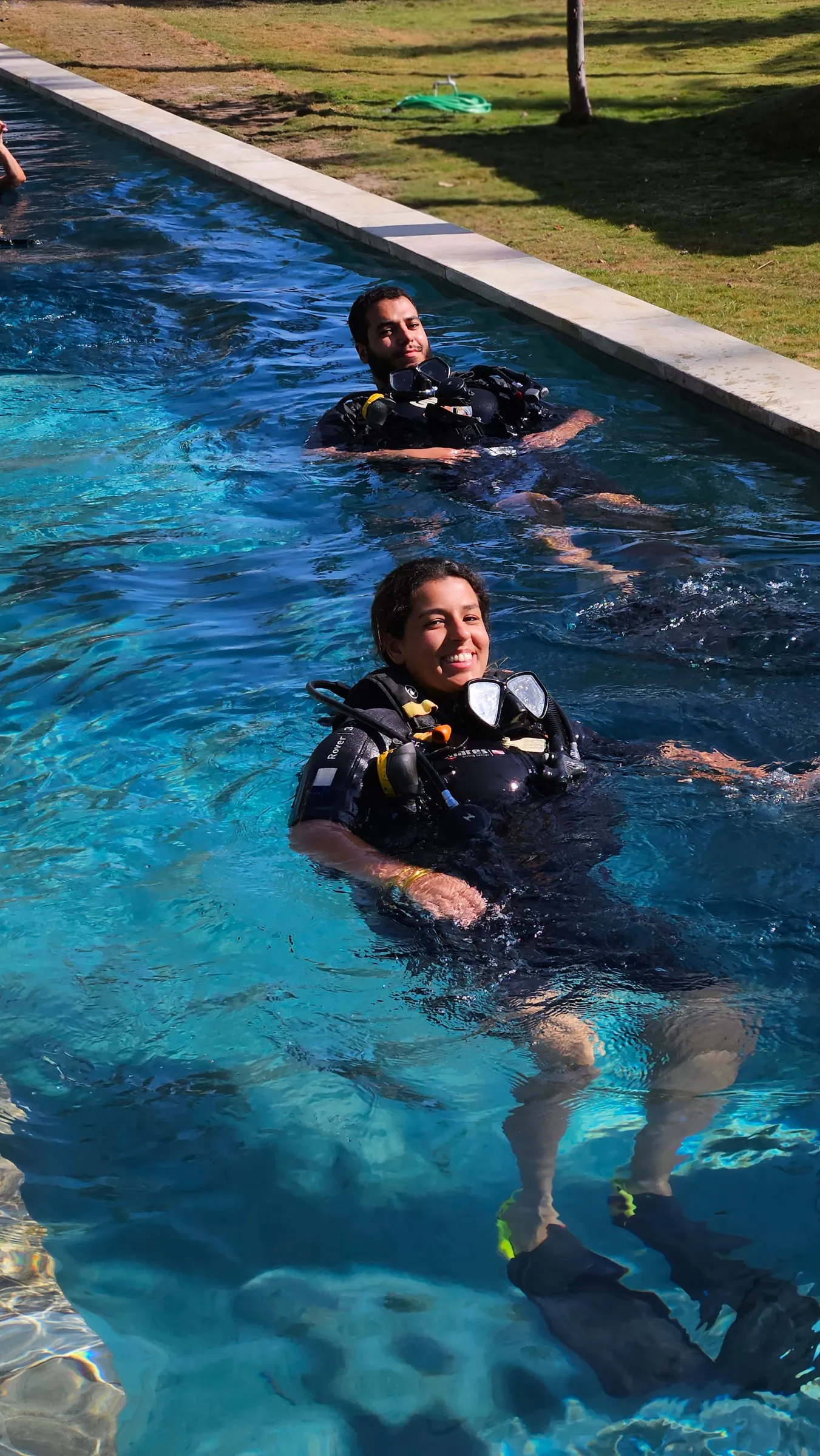 Student practicing in the pool